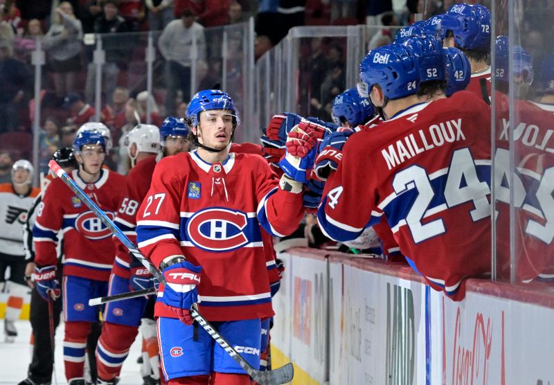 Sep 23, 2024; Montreal, Quebec, CAN; Montreal Canadiens forward Alex Barre-Boulet (27) celebrates with teammates after scoring a goal against the Philadelphia Flyers during the third period at the Bell Centre. Mandatory Credit: Eric Bolte-Imagn Images