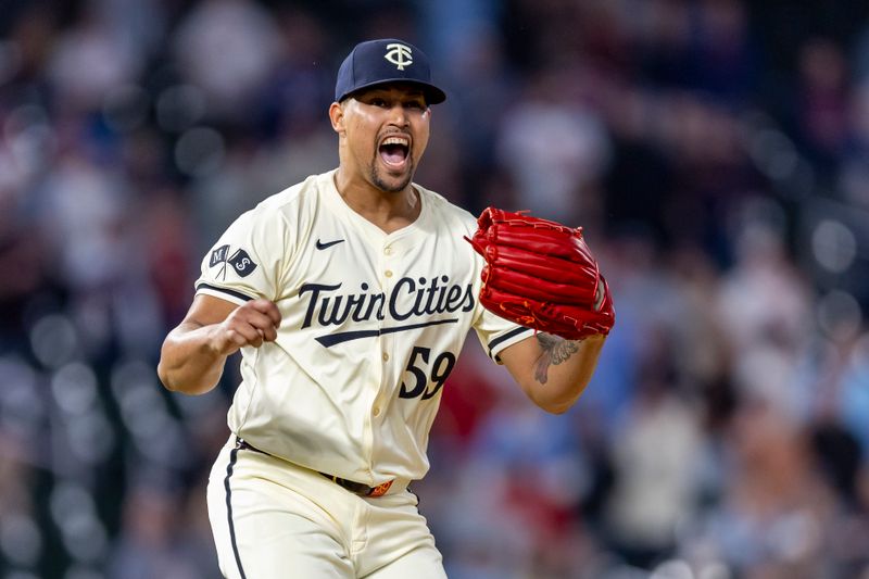 May 3, 2024; Minneapolis, Minnesota, USA; Minnesota Twins pitcher Jhoan Duran (59) reacts after defeating the Boston Red Sox at Target Field. Mandatory Credit: Jesse Johnson-USA TODAY Sports