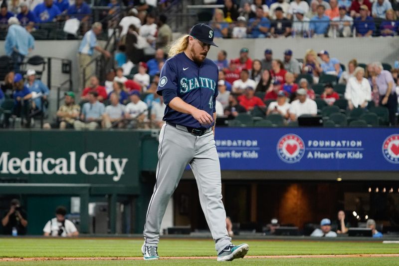 Apr 25, 2024; Arlington, Texas, USA; Seattle Mariners pitcher Ryne Stanek (45) leaves the field after being taken out of the game during the seventh inning against the Texas Rangers  at Globe Life Field. Mandatory Credit: Raymond Carlin III-USA TODAY Sports