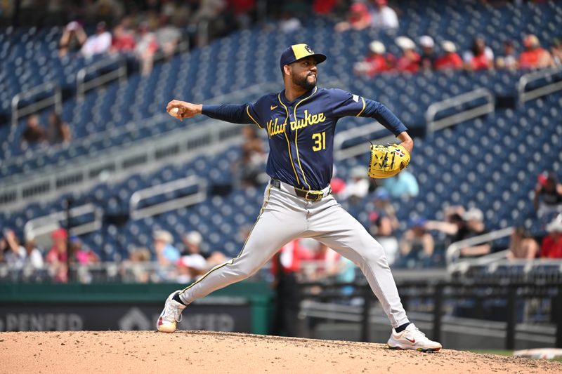 Aug 4, 2024; Washington, District of Columbia, USA; Milwaukee Brewers relief pitcher Joel Payamps (31) throws a pitch against the Washington Nationals during the sixth inning at Nationals Park. Mandatory Credit: Rafael Suanes-USA TODAY Sports