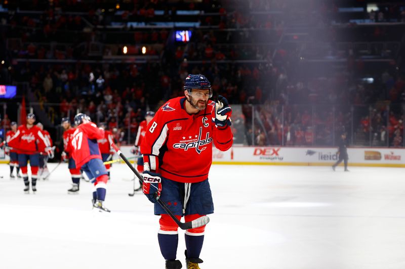 Mar 24, 2024; Washington, District of Columbia, USA; Washington Capitals left wing Alex Ovechkin (8) waves to his sons in the stands after defeating the Winnipeg Jets at Capital One Arena. Mandatory Credit: Amber Searls-USA TODAY Sports