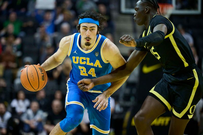 Feb 11, 2023; Eugene, Oregon, USA;  UCLA Bruins guard Jaime Jaquez Jr. (24) drives to the basket during the second half against Oregon Ducks forward Lok Wur (15) at Matthew Knight Arena. Mandatory Credit: Troy Wayrynen-USA TODAY Sports