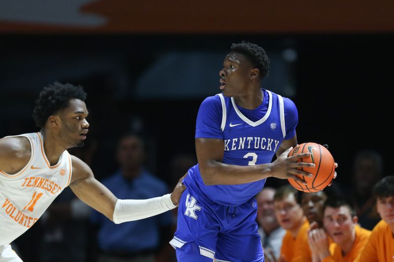 Mar 9, 2024; Knoxville, Tennessee, USA; Kentucky Wildcats guard Adou Thiero (3) looks to move the ball against Tennessee Volunteers forward Tobe Awaka (11) during the first half at Thompson-Boling Arena at Food City Center. Mandatory Credit: Randy Sartin-USA TODAY Sports