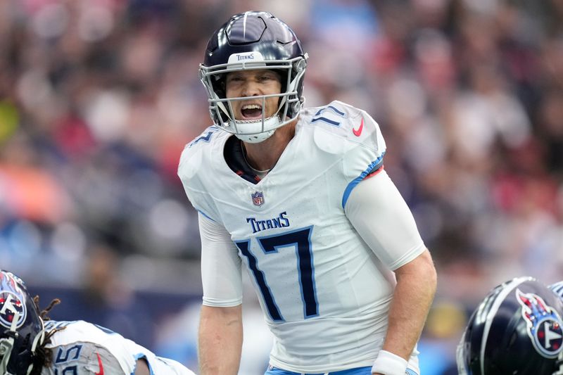 Tennessee Titans quarterback Ryan Tannehill (17) calls a play at the line of scrimmage during the second half of an NFL football game against the Houston Texans, Sunday, Dec. 31, 2023, in Houston. (AP Photo/Eric Christian Smith)