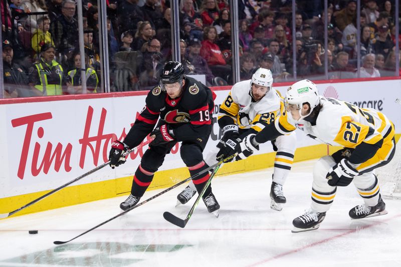 Mar 12, 2024; Ottawa, Ontario, CAN; Ottawa Senators right wing Drake Batherson (19) skates with the puck in front of Pittsburgh Penguins defensemen Marcus Pettersson (28) and Ryan Graves (27) in the first period at the Canadian Tire Centre. Mandatory Credit: Marc DesRosiers-USA TODAY Sports