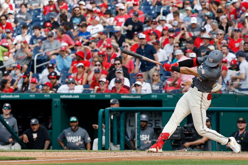 May 25, 2024; Washington, District of Columbia, USA; Washington Nationals first baseman Joey Gallo (24) hits an RBI single against the Seattle Mariners during the seventh inning at Nationals Park. Mandatory Credit: Geoff Burke-USA TODAY Sports