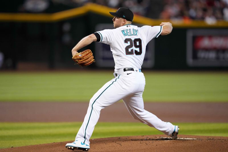 Sep 30, 2023; Phoenix, Arizona, USA; Arizona Diamondbacks starting pitcher Merrill Kelly (29) pitches against the Houston Astros during the first inning at Chase Field. Mandatory Credit: Joe Camporeale-USA TODAY Sports