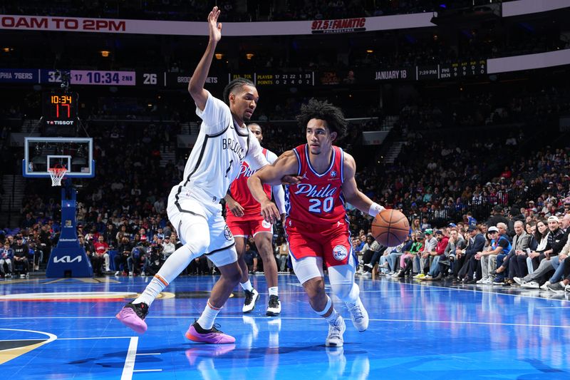 PHILADELPHIA, PA - NOVEMBER 22: Jared McCain #20 of the Philadelphia 76ers dribbles the ball during the game against the Brooklyn Nets during the Emirates NBA Cup game on November 22, 2024 at the Wells Fargo Center in Philadelphia, Pennsylvania NOTE TO USER: User expressly acknowledges and agrees that, by downloading and/or using this Photograph, user is consenting to the terms and conditions of the Getty Images License Agreement. Mandatory Copyright Notice: Copyright 2024 NBAE (Photo by Jesse D. Garrabrant/NBAE via Getty Images)