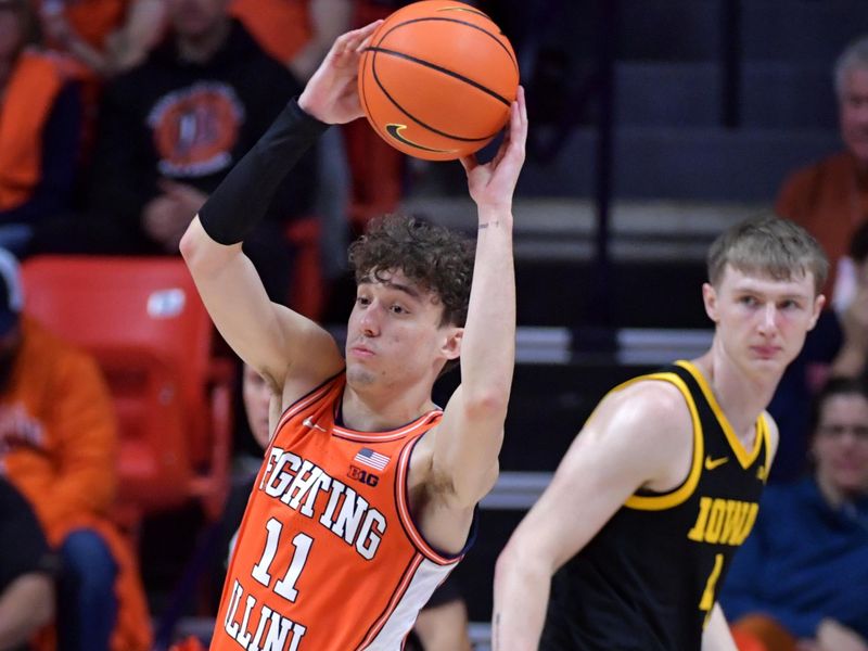 Feb 24, 2024; Champaign, Illinois, USA;  Illinois Fighting Illini guard Niccolo Moretti (11) looks to pass during the second half against the Iowa Hawkeyes at State Farm Center. Mandatory Credit: Ron Johnson-USA TODAY Sports