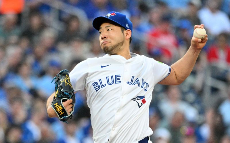 May 21, 2024; Toronto, Ontario, CAN;  Toronto Blue Jays starting pitcher Yusei Kikuchi (16) delivers a pitch against the Chicago White Sox in the second inning at Rogers Centre. Mandatory Credit: Dan Hamilton-USA TODAY Sports