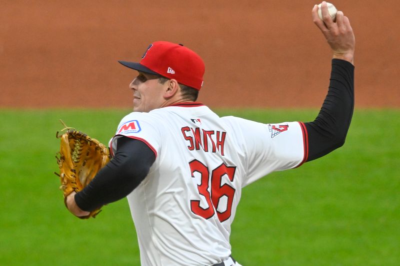 Apr 30, 2025; Cleveland, Ohio, USA; Cleveland Guardians relief pitcher Cade Smith (36) delivers a pitch in the seventh inning against the Minnesota Twins at Progressive Field. Mandatory Credit: David Richard-Imagn Images