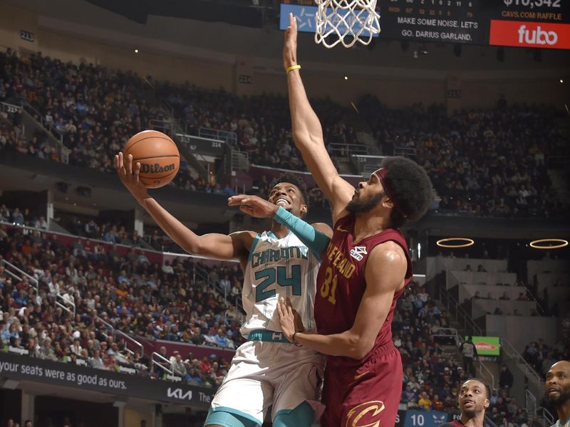 CLEVELAND, OH - JANUARY 5: Brandon Miller #24 of the Charlotte Hornets drives to the basket during the game against the Cleveland Cavaliers on January 5, 2025 at Rocket Mortgage FieldHouse in Cleveland, Ohio. NOTE TO USER: User expressly acknowledges and agrees that, by downloading and/or using this Photograph, user is consenting to the terms and conditions of the Getty Images License Agreement. Mandatory Copyright Notice: Copyright 2025 NBAE (Photo by David Liam Kyle/NBAE via Getty Images)