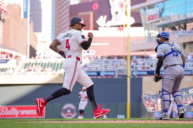 May 28, 2024; Minneapolis, Minnesota, USA; Minnesota Twins shortstop Carlos Correa (4) scores against the Kansas City Royals in the first inning at Target Field. Mandatory Credit: Brad Rempel-USA TODAY Sports