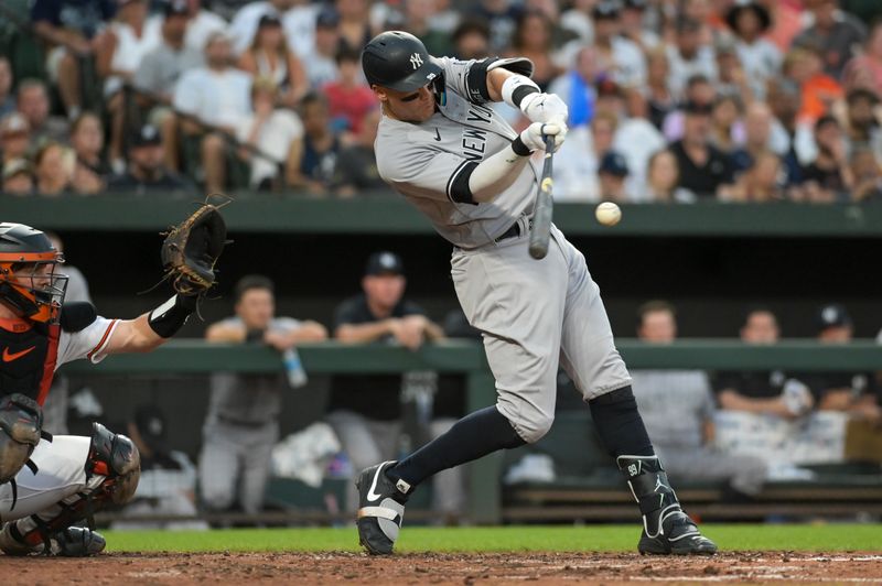 Jul 29, 2023; Baltimore, Maryland, USA;  New York Yankees right fielder Aaron Judge (99) hits a two run home run in the third inning against the Baltimore Orioles at Oriole Park at Camden Yards. Mandatory Credit: Tommy Gilligan-USA TODAY Sports