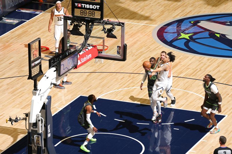 MINNEAPOLIS, MN -  NOVEMBER 1: Julian Strawther #3 of the Denver Nuggets drives to the basket during the game against the Minnesota Timberwolves on November 1, 2024 at Target Center in Minneapolis, Minnesota. NOTE TO USER: User expressly acknowledges and agrees that, by downloading and or using this Photograph, user is consenting to the terms and conditions of the Getty Images License Agreement. Mandatory Copyright Notice: Copyright 2024 NBAE (Photo by David Sherman/NBAE via Getty Images)