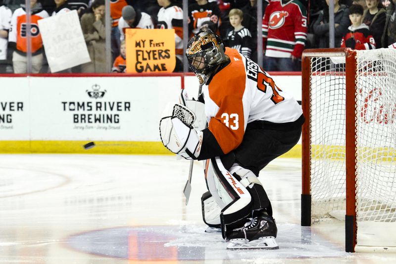 Jan 29, 2025; Newark, New Jersey, USA; Philadelphia Flyers goaltender Samuel Ersson (33) warms up before a game against New Jersey Devils at Prudential Center. Mandatory Credit: John Jones-Imagn Images