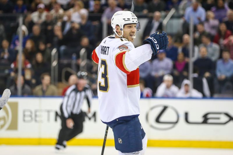 Mar 4, 2024; New York, New York, USA;  Florida Panthers center Sam Reinhart (13) celebrates after scoring a goal in the second period against the New York Rangers at Madison Square Garden. Mandatory Credit: Wendell Cruz-USA TODAY Sports