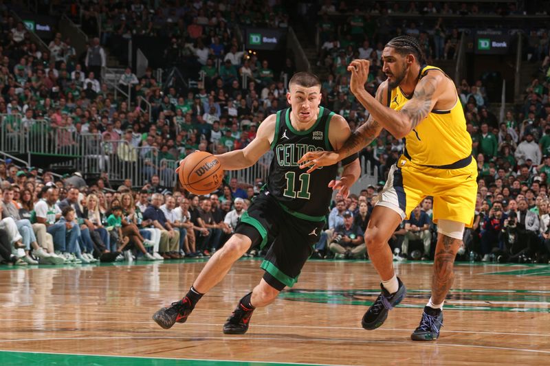 BOSTON, MA - MAY 23: Payton Pritchard #11 of the Boston Celtics dribbles the ball during the game against the Indiana Pacers during Game 2 of the Eastern Conference Finals of the 2024 NBA Playoffs on May 23, 2024 at the TD Garden in Boston, Massachusetts. NOTE TO USER: User expressly acknowledges and agrees that, by downloading and or using this photograph, User is consenting to the terms and conditions of the Getty Images License Agreement. Mandatory Copyright Notice: Copyright 2024 NBAE  (Photo by Nathaniel S. Butler/NBAE via Getty Images)