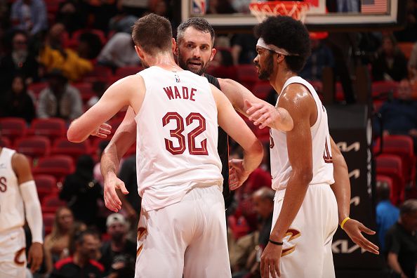 MIAMI, FL - DECEMBER 8:  Kevin Love #42 of the Miami Heat congratulates Dean Wade #32 of the Cleveland Cavaliers after the game on December 8, 2023 at Kaseya Center in Miami, Florida. NOTE TO USER: User expressly acknowledges and agrees that, by downloading and or using this Photograph, user is consenting to the terms and conditions of the Getty Images License Agreement. Mandatory Copyright Notice: Copyright 2023 NBAE (Photo by Issac Baldizon/NBAE via Getty Images)