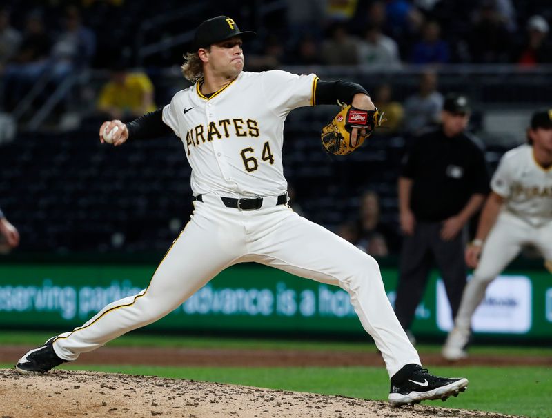 Sep 24, 2024; Pittsburgh, Pennsylvania, USA; Pittsburgh Pirates relief pitcher Isaac Mattson (64) pitches against the Milwaukee Brewers during the sixth inning at PNC Park. Mandatory Credit: Charles LeClaire-Imagn Images