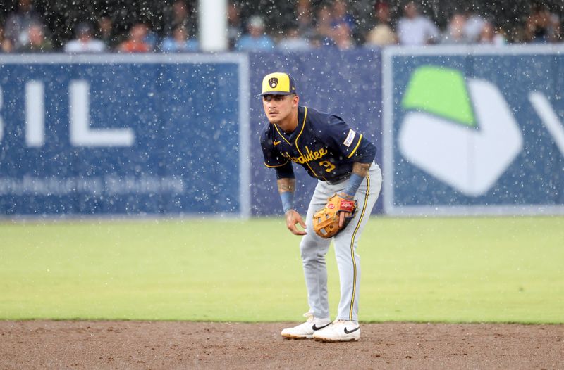 May 10, 2025; St. Petersburg, Florida, USA; Milwaukee Brewers shortstop Joey Ortiz (3) looks on in the rain during the fifth inning against the Tampa Bay Rays at George M. Steinbrenner Field. Mandatory Credit: Kim Klement Neitzel-Imagn Images