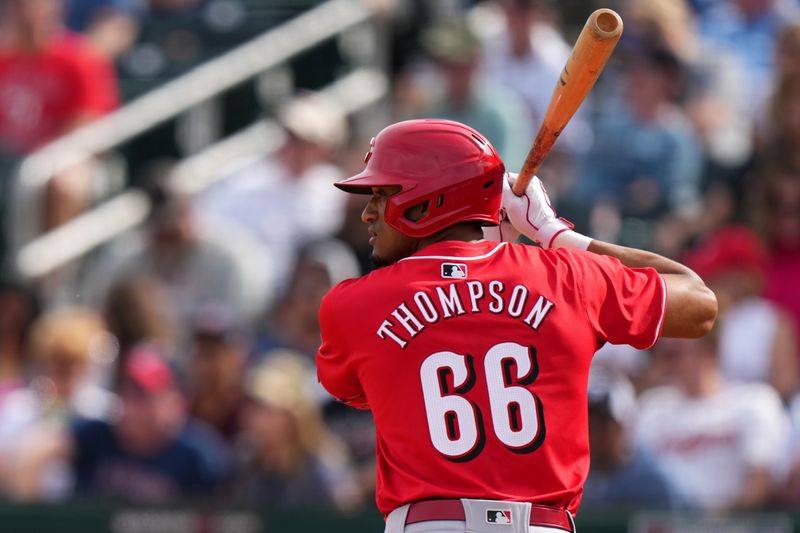 Feb. 24, 2024; Goodyear, Arizona, USA; Cincinnati Reds outfielder Bubba Thompson bats in the sixth inning during a MLB spring training baseball game against the Cleveland Guardians at Goodyear Ballpark. Mandatory Credit: Kareem Elgazzar-USA TODAY Sports