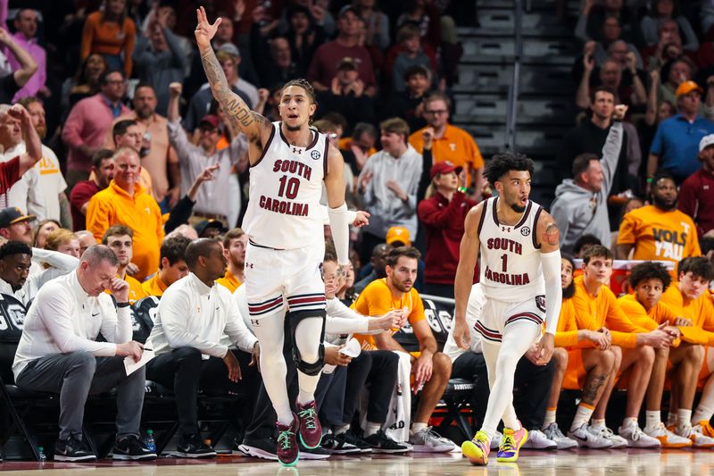 Mar 6, 2024; Columbia, South Carolina, USA; South Carolina Gamecocks guard Myles Stute (10) celebrates a three point basket against the Tennessee Volunteers in the first half at Colonial Life Arena. Mandatory Credit: Jeff Blake-USA TODAY Sports