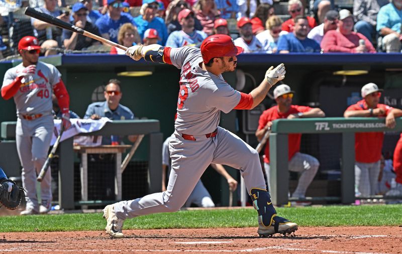 May 18, 2025; Kansas City, Missouri, USA;  St. Louis Cardinals third baseman Nolan Arenado (28) singles in the fifth inning against the Kansas City Royals at Kauffman Stadium. Mandatory Credit: Peter Aiken-Imagn Images