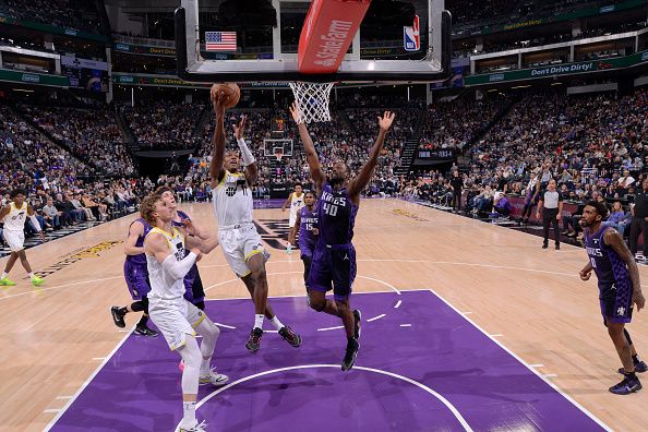 SACRAMENTO, CA - DECEMBER 16: Kris Dunn #11 of the Utah Jazz drives to the basket during the game against the Sacramento Kings on December 16, 2023 at Golden 1 Center in Sacramento, California. NOTE TO USER: User expressly acknowledges and agrees that, by downloading and or using this Photograph, user is consenting to the terms and conditions of the Getty Images License Agreement. Mandatory Copyright Notice: Copyright 2023 NBAE (Photo by Rocky Widner/NBAE via Getty Images)