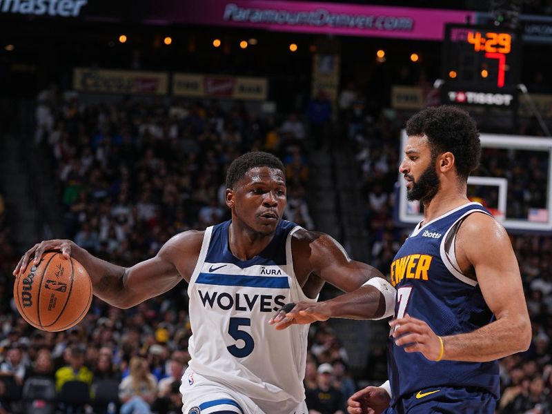 DENVER, CO - APRIL 10:  Anthony Edwards #5 of the Minnesota Timberwolves dribbles the ball during the game against the Denver Nuggets on April 10, 2024 at the Ball Arena in Denver, Colorado. NOTE TO USER: User expressly acknowledges and agrees that, by downloading and/or using this Photograph, user is consenting to the terms and conditions of the Getty Images License Agreement. Mandatory Copyright Notice: Copyright 2024 NBAE (Photo by Bart Young/NBAE via Getty Images)