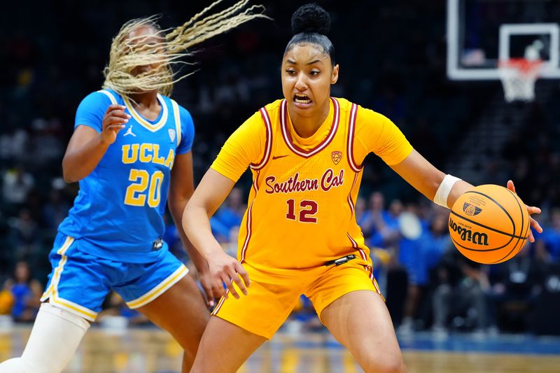 Mar 8, 2024; Las Vegas, NV, USA; USC Trojans guard JuJu Watkins (12) dribbles ahead of UCLA Bruins guard Charisma Osborne (20) during the fourth quarter at MGM Grand Garden Arena. Mandatory Credit: Stephen R. Sylvanie-USA TODAY Sports