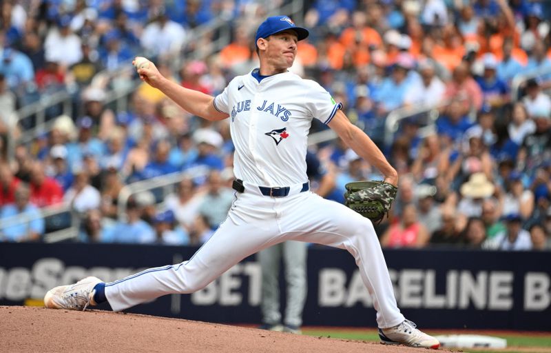 Jul 25, 2024; Toronto, Ontario, CAN;  Toronto Blue Jays starting pitcher Chris Bassitt (40) delivers against the Tampa Bay Rays in the first inning at Rogers Centre. Mandatory Credit: Dan Hamilton-USA TODAY Sports