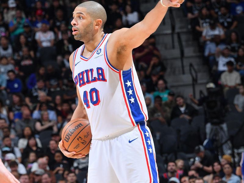 SAN ANTONIO, TX - APRIL 7: Nicolas Batum #40 of the Philadelphia 76ers looks to pass the ball during the game against the San Antonio Spurs on April 7, 2024 at the Frost Bank Center in San Antonio, Texas. NOTE TO USER: User expressly acknowledges and agrees that, by downloading and or using this photograph, user is consenting to the terms and conditions of the Getty Images License Agreement. Mandatory Copyright Notice: Copyright 2024 NBAE (Photos by Michael Gonzales/NBAE via Getty Images)