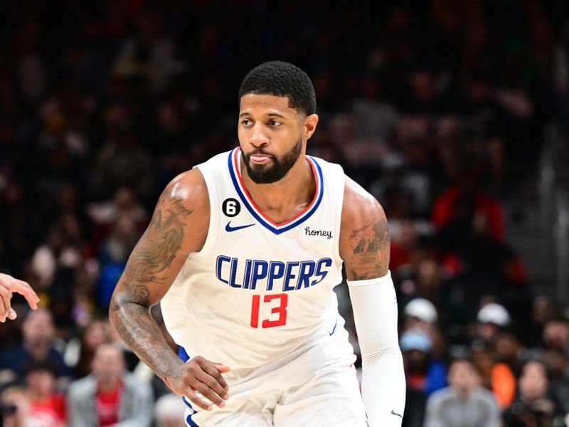 ATLANTA, GA - JANUARY 28: Paul George #13 of the LA Clippers drives to the basket during the game on January 28, 2023 at State Farm Arena in Atlanta, Georgia.  NOTE TO USER: User expressly acknowledges and agrees that, by downloading and/or using this Photograph, user is consenting to the terms and conditions of the Getty Images License Agreement. Mandatory Copyright Notice: Copyright 2023 NBAE (Photo by Adam Hagy/NBAE via Getty Images)