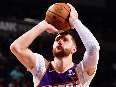 PHOENIX, AZ - DECEMBER 12: Jusuf Nurkic #20 of the Phoenix Suns shoots a free throw during the game against the Golden State Warriors on December 12, 2023 at Footprint Center in Phoenix, Arizona. NOTE TO USER: User expressly acknowledges and agrees that, by downloading and or using this photograph, user is consenting to the terms and conditions of the Getty Images License Agreement. Mandatory Copyright Notice: Copyright 2023 NBAE (Photo by Barry Gossage/NBAE via Getty Images)