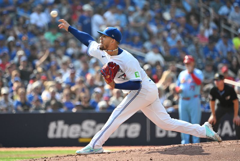 Sep 14, 2024; Toronto, Ontario, CAN;  Toronto Blue Jays starting pitcher Jose Berrios (17) delivers a pitch against the St. Louis Cardinals in the second inning at Rogers Centre. Mandatory Credit: Dan Hamilton-Imagn Images