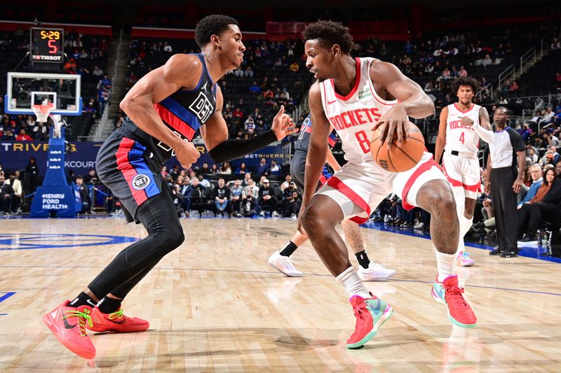 DETROIT, MI - JANUARY 12: Jae'Sean Tate #8 of the Houston Rockets dribbles the ball during the game against the Detroit Pistons on January 12, 2024 at Little Caesars Arena in Detroit, Michigan. NOTE TO USER: User expressly acknowledges and agrees that, by downloading and/or using this photograph, User is consenting to the terms and conditions of the Getty Images License Agreement. Mandatory Copyright Notice: Copyright 2024 NBAE (Photo by Chris Schwegler/NBAE via Getty Images)