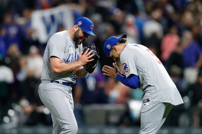 Sep 11, 2023; Denver, Colorado, USA; Chicago Cubs relief pitcher Michael Fulmer (32) and designated hitter Christopher Morel (5) celebrate after the game against the Colorado Rockies at Coors Field. Mandatory Credit: Isaiah J. Downing-USA TODAY Sports