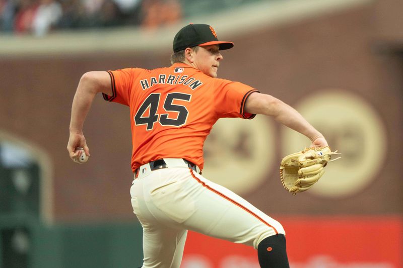 Jul 26, 2024; San Francisco, California, USA;  San Francisco Giants pitcher Kyle Harrison (45) pitches during the first inning against the Colorado Rockies at Oracle Park. Mandatory Credit: Stan Szeto-USA TODAY Sports