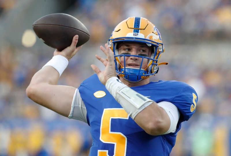 Sep 9, 2023; Pittsburgh, Pennsylvania, USA; Pittsburgh Panthers quarterback Phil Jurkovec (5) throws on the sidelines between plays against he Cincinnati Bearcats during the first quarter at Acrisure Stadium. Mandatory Credit: Charles LeClaire-USA TODAY Sports