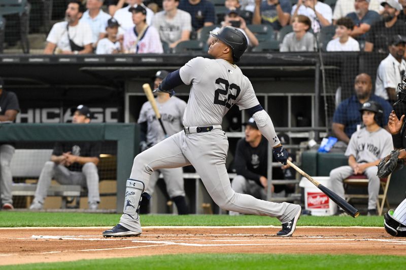 Aug 14, 2024; Chicago, Illinois, USA;  New York Yankees outfielder Juan Soto (22) hits a home run against the Chicago White Sox during the first inning at Guaranteed Rate Field. Mandatory Credit: Matt Marton-USA TODAY Sports