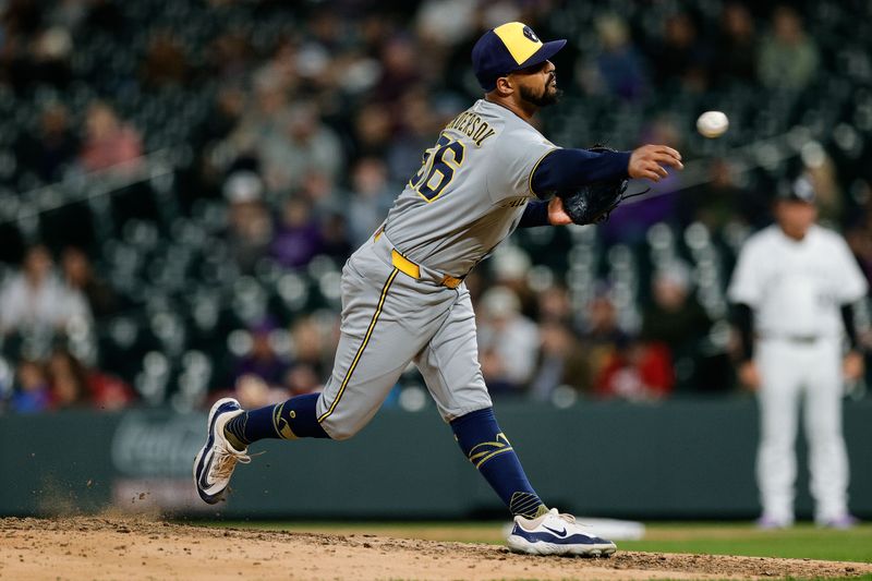 Apr 9, 2025; Denver, Colorado, USA; Milwaukee Brewers relief pitcher Grant Anderson (56) pitches in the eighth inning against the Colorado Rockies at Coors Field. Mandatory Credit: Isaiah J. Downing-Imagn Images