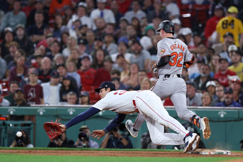 Sep 10, 2024; Boston, Massachusetts, USA; Boston Red Sox first baseman Triston Casas (36) reaches for a ball during the seventh inning against the Baltimore Orioles at Fenway Park. Mandatory Credit: Paul Rutherford-Imagn Images