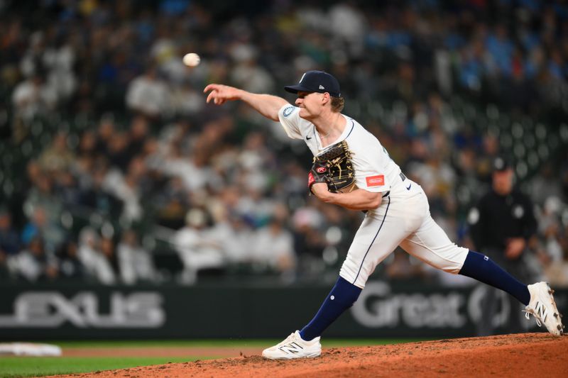 May 12, 2025; Seattle, Washington, USA; Seattle Mariners relief pitcher Troy Taylor (59) pitches to the New York Yankees during the eighth inning at T-Mobile Park. Mandatory Credit: Steven Bisig-Imagn Images