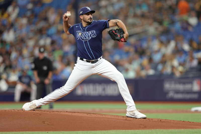 Oct 4, 2023; St. Petersburg, Florida, USA; Tampa Bay Rays starting pitcher Zach Eflin (24) pitches against the Texas Rangers in the first inning during game two of the Wildcard series for the 2023 MLB playoffs at Tropicana Field. Mandatory Credit: Nathan Ray Seebeck-USA TODAY Sports