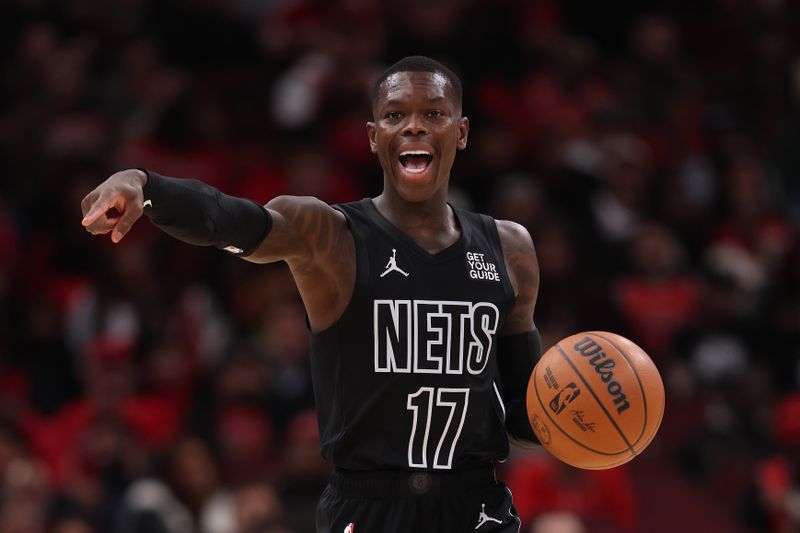 CHICAGO, ILLINOIS - DECEMBER 02: Dennis Schroder #17 of the Brooklyn Nets dribbles up the court against the Chicago Bulls during the first half at the United Center on December 02, 2024 in Chicago, Illinois. NOTE TO USER: User expressly acknowledges and agrees that, by downloading and or using this photograph, User is consenting to the terms and conditions of the Getty Images License Agreement.  (Photo by Michael Reaves/Getty Images)