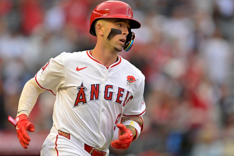 May 26, 2025; Anaheim, California, USA;  Los Angeles Angels shortstop Zach Neto (9) rounds the bases a solo home run in the first inning against the New York Yankees at Angel Stadium. Mandatory Credit: Jayne Kamin-Oncea-Imagn Images