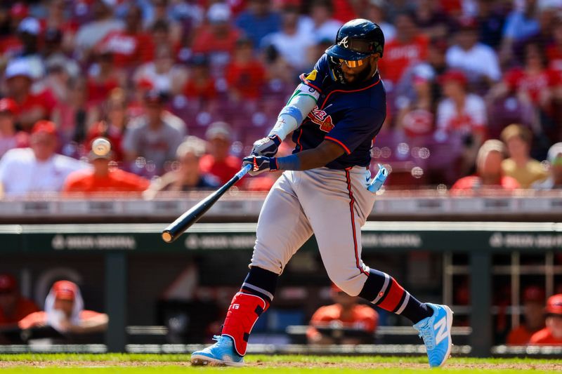 Sep 19, 2024; Cincinnati, Ohio, USA; Atlanta Braves outfielder Michael Harris II (23) hits a solo home run in the eighth inning against the Cincinnati Reds at Great American Ball Park. Mandatory Credit: Katie Stratman-Imagn Images