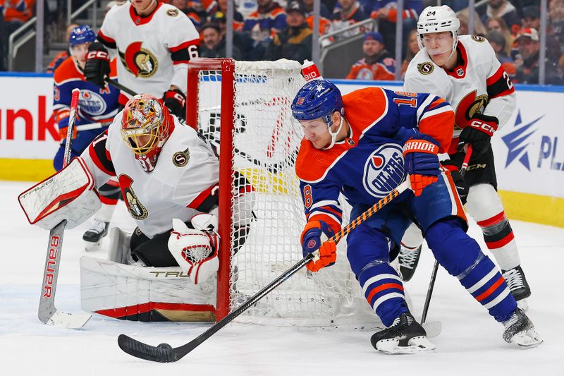 Jan 6, 2024; Edmonton, Alberta, CAN; Edmonton Oilers forward Zach Hyman (18) controls the puck against Ottawa Senators goaltender Anton Forsberg (31) during the first period at Rogers Place. Mandatory Credit: Perry Nelson-USA TODAY Sports