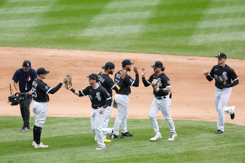 Sep 28, 2023; Chicago, Illinois, USA; Chicago White Sox players celebrate after defeating the Arizona Diamondbacks at Guaranteed Rate Field. Mandatory Credit: Kamil Krzaczynski-USA TODAY Sports